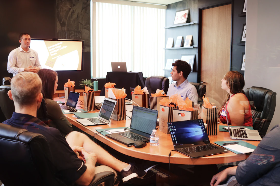 IMC Group advisory team in a client meeting